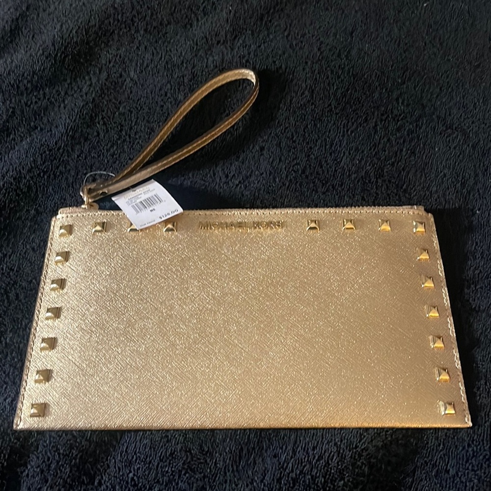 New authentic with tag Sandrine Studded zip clutch.